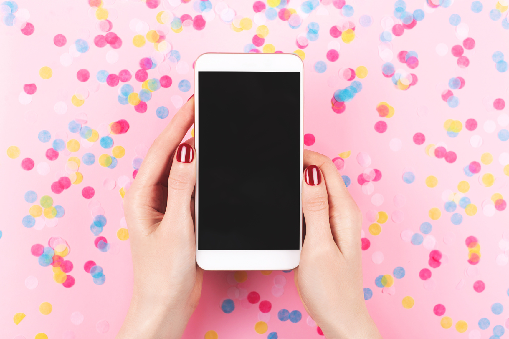 Woman's Hands Holding Smartphone